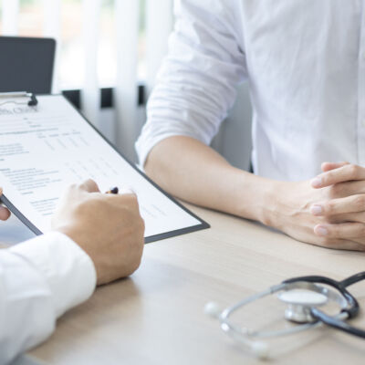 Specialist doctor took a history to ask about the symptoms of pa